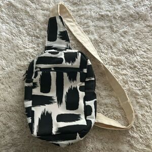 Black and white fabric crossbody bag